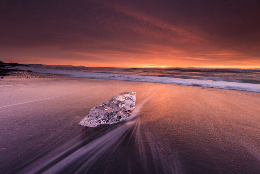 Morning Jewel 
 Morning Light and Wave Trails, Jkulsrln Beach 
 Keywords: Iceland, Jökulsárlón, beach, black sand, dawn, ice, landscapes, sunrise, waves, winter