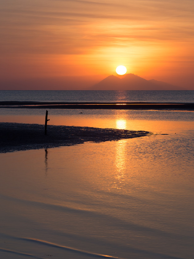 Komodo Sunset 
 Sunset from south of Labuan Bajo, silhouetting Pulau Sangeang 
 Keywords: Flores, Indonesia, Labuan Bajo, Pulau Sangeang, coast, landscapes, sea, seascapes, shore, sunset, travel