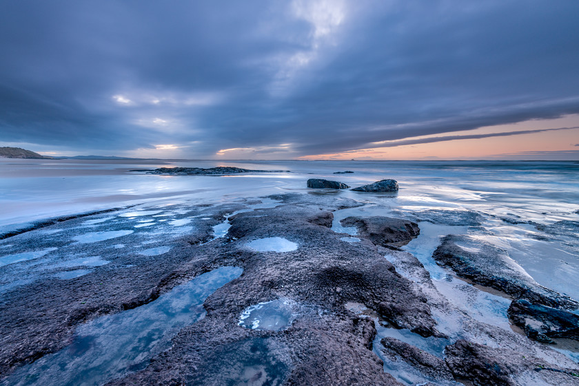 Dusk Pools 
 www.keithmuirphoto.co.uk 
 Keywords: Bamburgh, England, Northumbria, Sky, beach, clouds, coast, landscapes, sea, seascapes, shore, sunset, water, waves