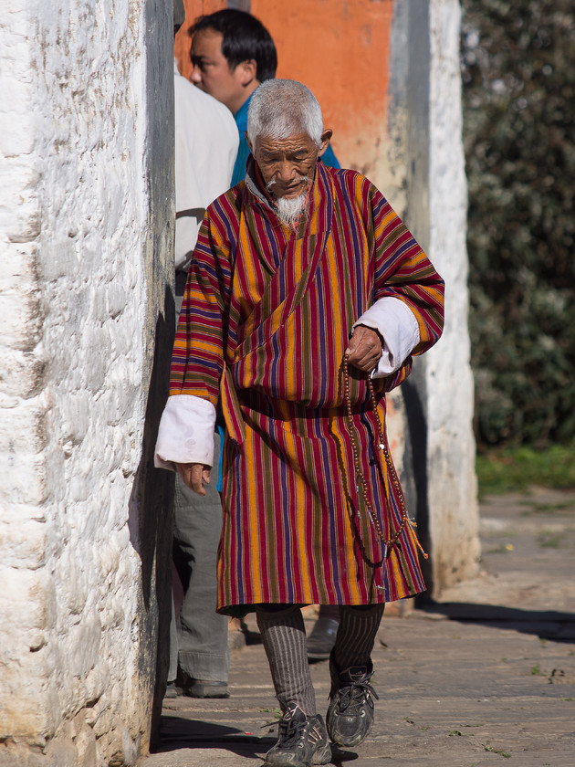 Festivalgoer, Jakar Tsechu 
 Keywords: Bhumtang, Bhutan, Jakar, Jampey Lakhang, Olympus, people, travel, tsechu