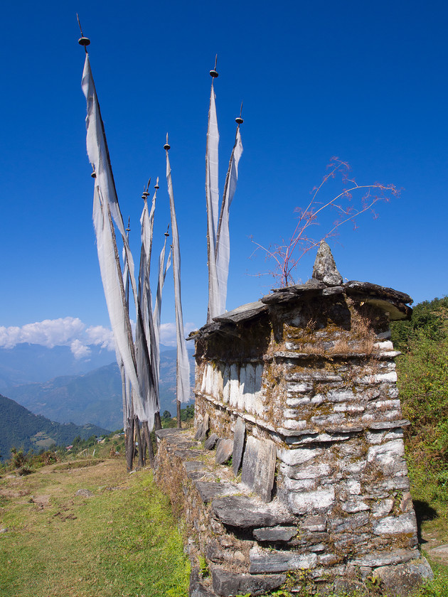 Mani Wall, Chaling 
 Keywords: Bhutan, Buddhism, Chaling, Eastern Bhutan, Olympus, mani wall, prayer flags