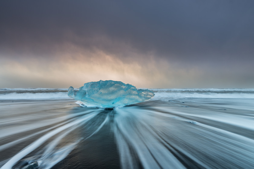 Ice Blue 
 Keywords: Breiðamerkursandur, Iceland, Jökulsárlón, beach, black sand, coast, dawn, ice, landscapes, sea, seascapes, shore, sunrise, travel, waves, winter