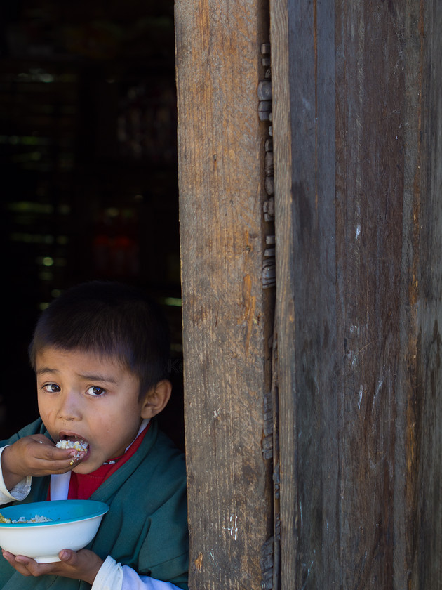 Lunch Break, Bhutan 
 Keywords: Bhutan, Olympus, people, street photography