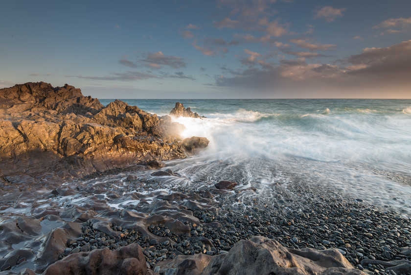 Sunset Light and Pebbles 
 Keywords: Canary Islands, Spain, Tenerife, coast, landscapes, rocks, sea, seascapes, shore, sunset, travel