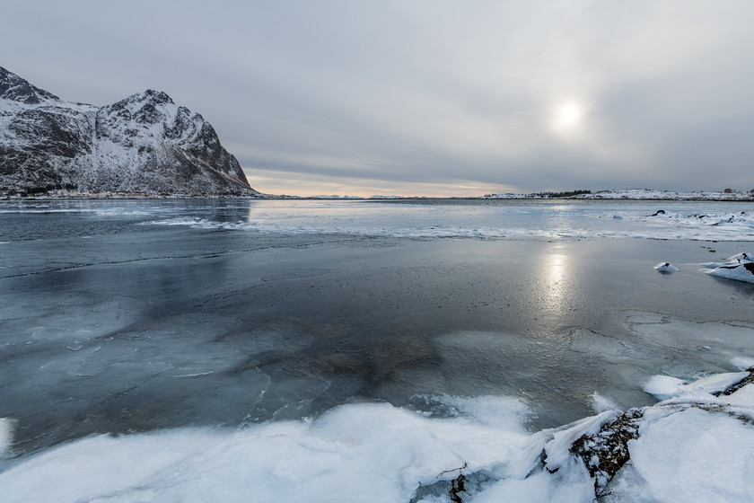 DSC1902 
 www.keithmuirphoto.co.uk 
 Keywords: Arctic, D850, Lofoten, Norway, Straumsbukta, WPH, Wild Photography Holidays, coast, ice, landscapes, rocks, sea, sea ice, shore, travel, winter, winter sun