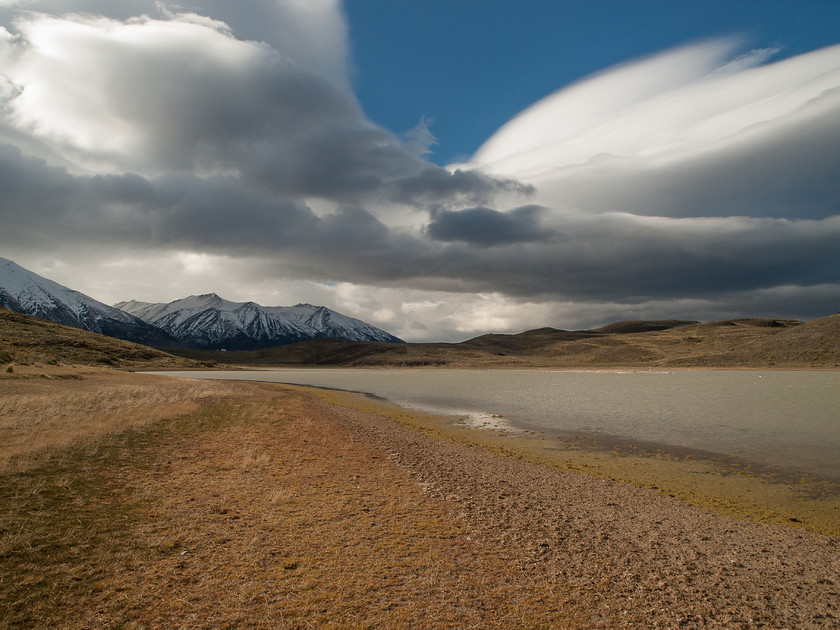 PA135331 
 Laguna Azul 
 Keywords: Amarga, Chile, Cruce Ruta 9 - Porteria Sarmiento - Guarderia Lago Grey, Cruce Ruta Y-150 - Laguna Azul, Patagonia, Región de Magallanes y de la Antártica Chilena, Rio Paine, South America, Torres del Paine, Y-150, Y-156, Y-160, clouds, lakes, landscapes, travel