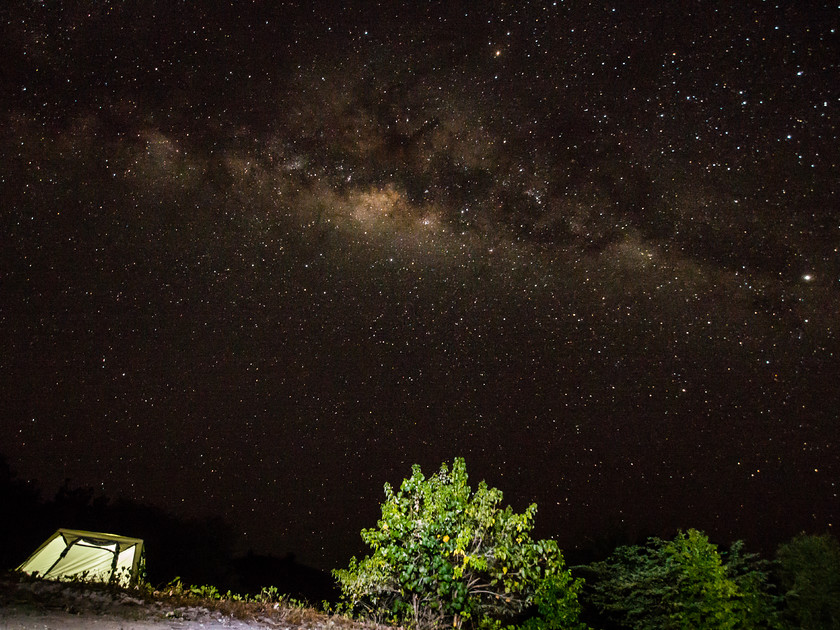 Camping Under the Milky Way 
 Keywords: Indonesia, Komodo National Park, milky way, night, night photography, night sky, stars, travel