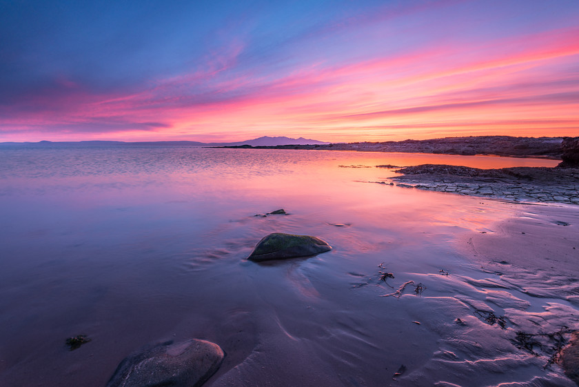 Arran Ablaze 
 www.keithmuirphoto.co.uk 
 Keywords: Arran, Ayrshire, Scotland, Seamill, beach, clouds, coast, landscapes, sea, seascapes, shore, sunset