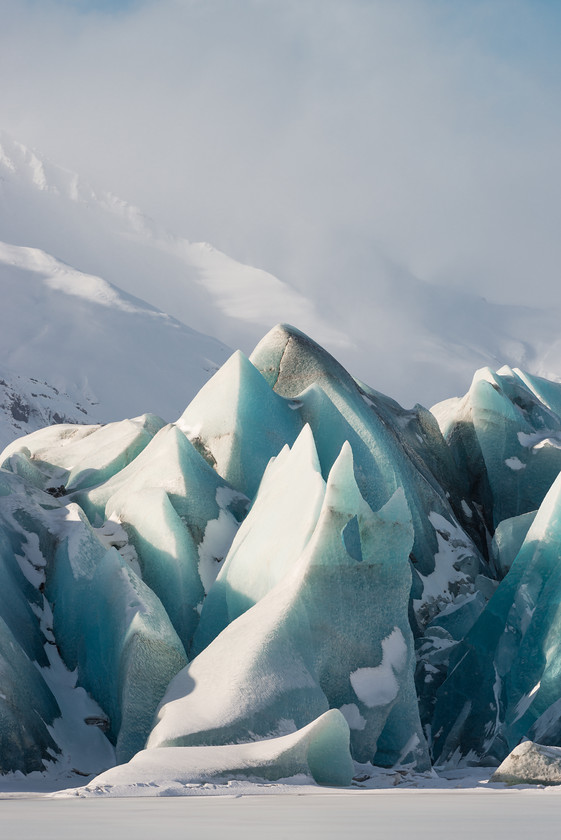 Glaciar Twist 
 Glacial Twist, Heinabergsjokull 
 Keywords: Heinabergsjokull, Iceland, glaciar, ice, landscapes, mountains, snow, travel, winter